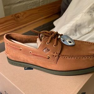 Tan washable boat shoes. Feels like suede very smooth elegant. Brand new.